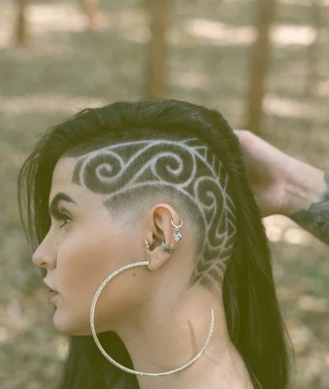 Abstract Swirls Hair Shave Design tattoo idea for women on neck.