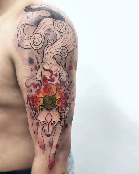 Amaterasu wolf and cloud Japanese anime tattoo for men on upper arm