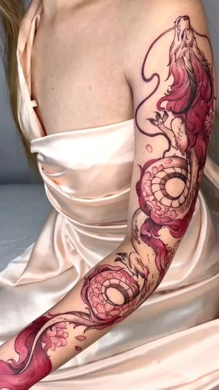 Anime Japanese dragon and floral tattoo idea for women on arm