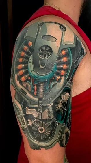 Biomechanical mechanic tattoo design for men on arm and shoulder