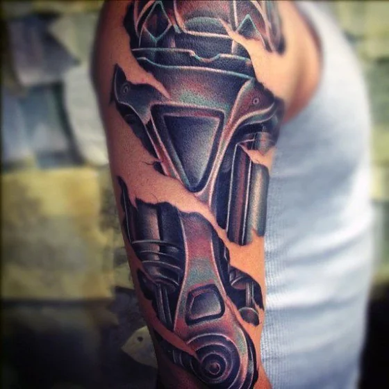 Biomechanical mechanical gear tattoo for men on upper arm.