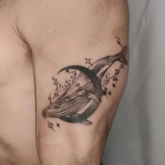 Black And Grey Fine Line whale, moon, star tattoo design for men on upper arm