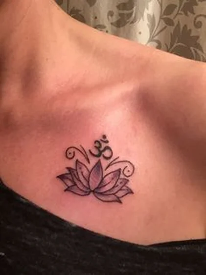 Black And Grey Linework Lotus Om tattoo for women on chest