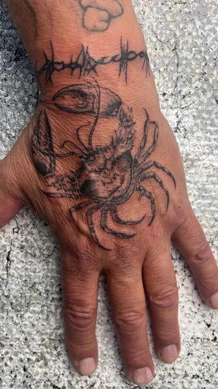 Black And Grey Patchwork Cancer crab and Barbed Wire tattoo for men on hand