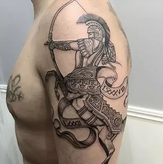 Black And Grey Woodcut Sagittarius tattoo idea for men on Upper Arm