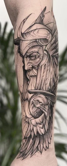Black and Grey Sketch Viking and Raven tattoo idea for men on forearm