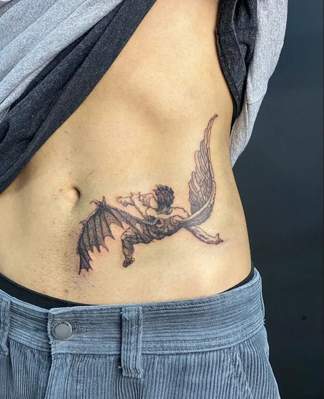 Black and Grey fine line angel with wings tattoo design for men on rib and hip tattoo ideas