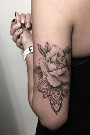 Black and grey dotwork floral rose Mandala tattoo design for women.