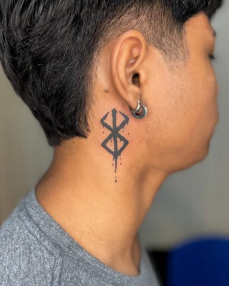 Blackwork Berserk Symbol tattoo design for men and women on neck