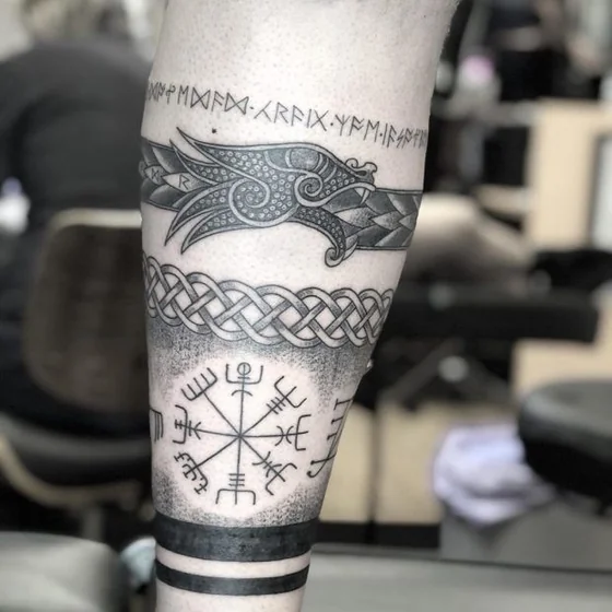 Blackwork Neo-Traditional Viking dragon compass tattoo design for men on calf