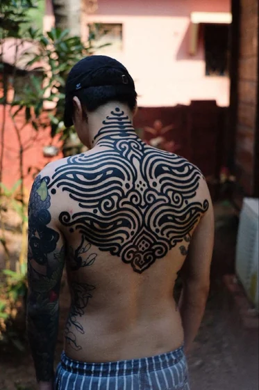 Blackwork Tribal Abstract Pattern tattoo design for men on back and neck