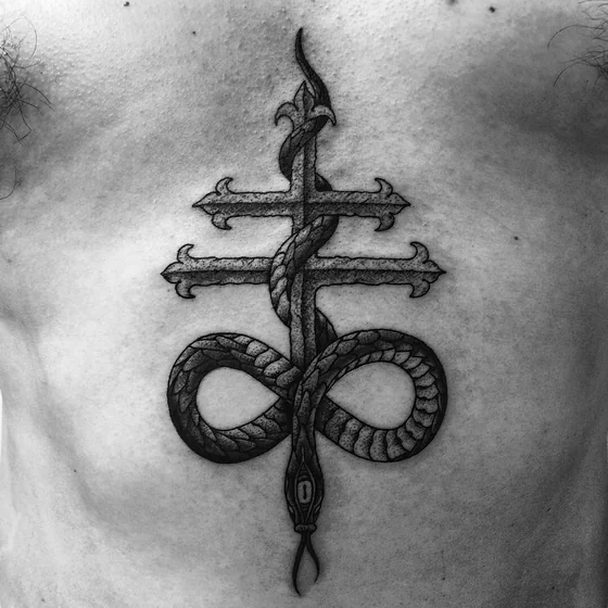 Blackwork dotwork snake cross tattoo for men on sternum