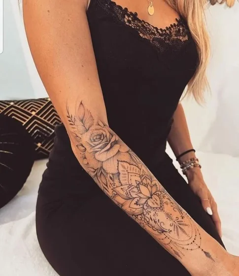 Blackwork fine line rose floral mandala tattoo design for women on forearm