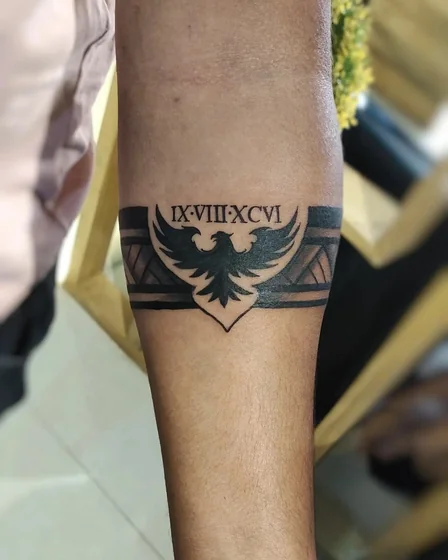 Blackwork geometric phoenix eagle Roman numeral armband tattoo for men