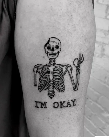 Blackwork skull skeleton & 'I'm Okay' quote tattoo design for men/women on upper arm
