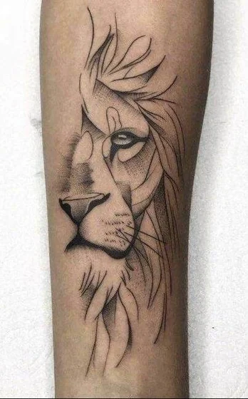 Bold linework and realism lion tattoo design for men on forearm