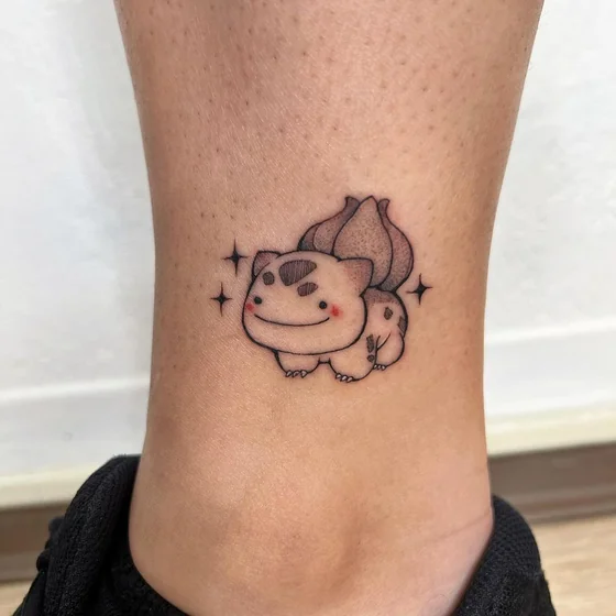 Cute Anime Bulbasaur video game tattoo design for ladies on ankle