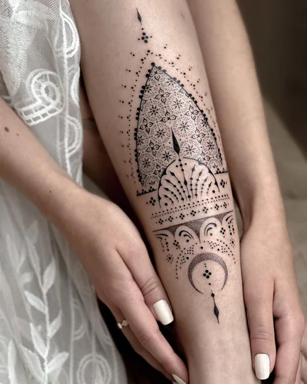 Delicate Fine Line Dotwork Moon Mandala tattoo for women on Calf