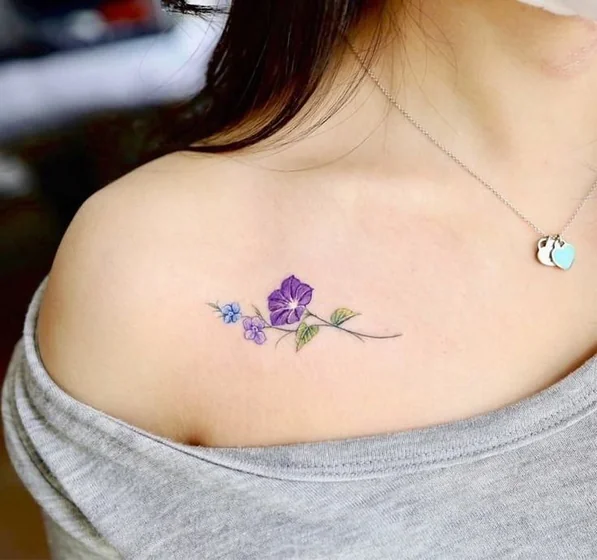 Delicate floral fine line tattoo idea for women on shoulder