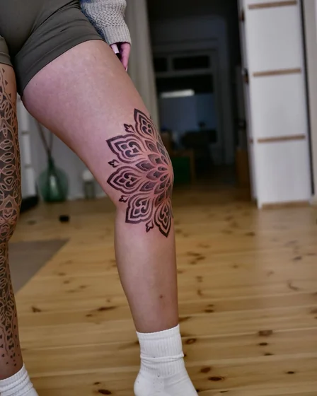 Dotwork Floral Mandala tattoo for women on knee and leg