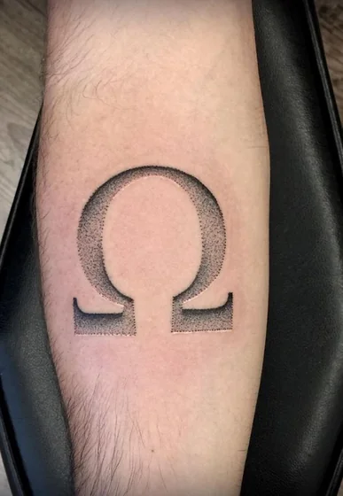 Dotwork Omega symbol tattoo design for men on forearm