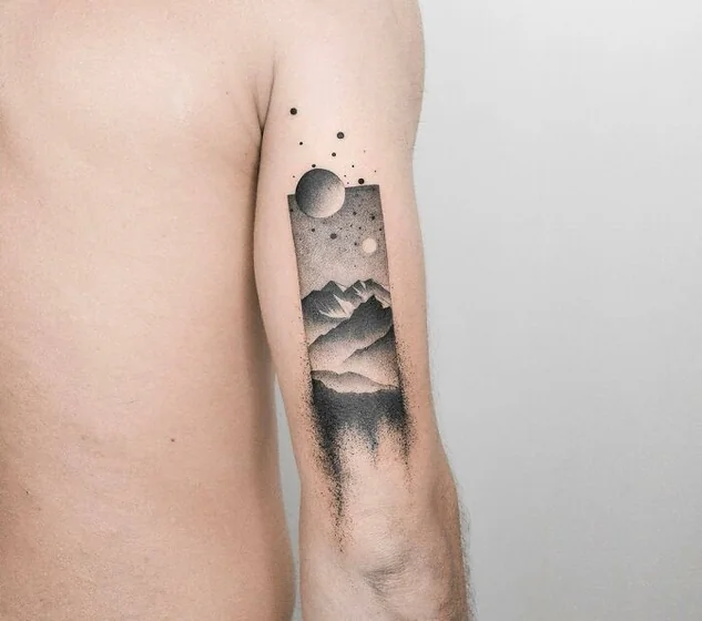 Dotwork minimalist mountain, moon, star tattoo design for men on upper arm