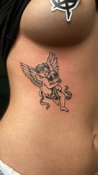 Fine Line Black And Grey angel and skull tattoo design for women on rib