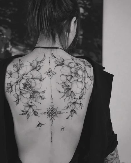 Fine Line, Black And Grey floral and vine tattoo design for women on back