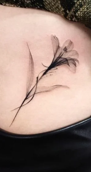 Fine Line Black And Grey floral tattoo design for women on back