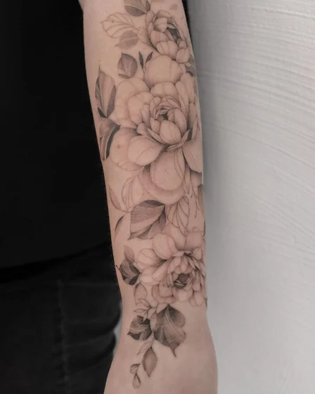 Fine Line Black And Grey floral tattoo design for women on forearm