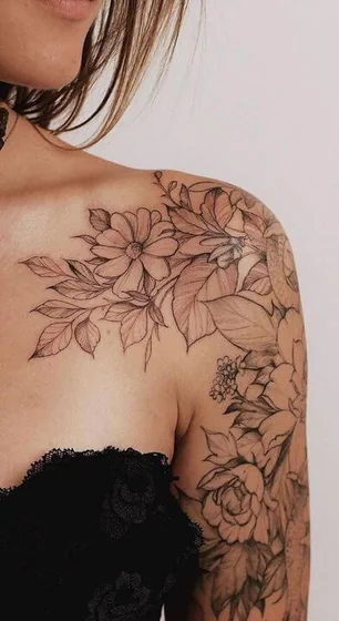 Fine Line Black and Grey floral tattoo idea for women on shoulder