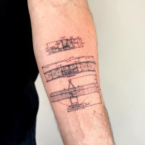 Fine Line Blueprint airplane tattoo design for men on forearm