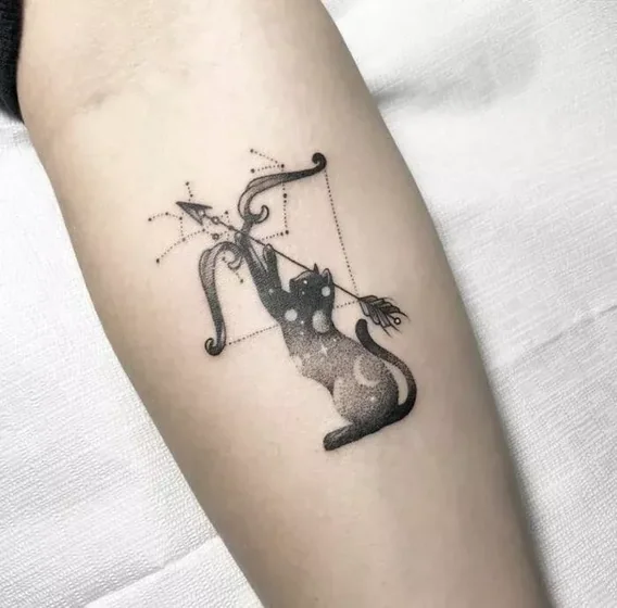 Fine Line Dotwork Cat Sagittarius Moon tattoo design for women on forearm