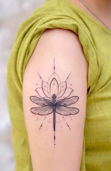 Fine Line Dotwork Dragonfly Lotus tattoo design for women on Upper Arm