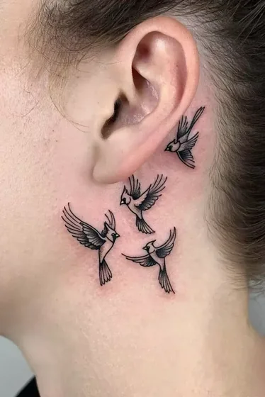 Fine Line Dotwork cardinal bird tattoo for women on neck/ear