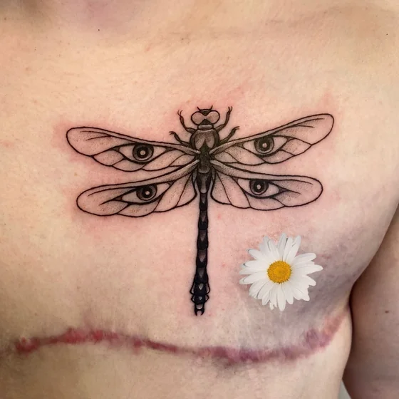 Fine Line Dotwork dragonfly with eyes tattoo design for men on chest tattoo ideas