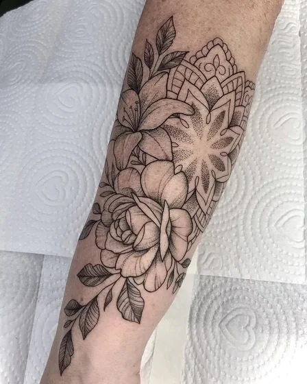 Fine Line Dotwork floral mandala rose tattoo for women on forearm