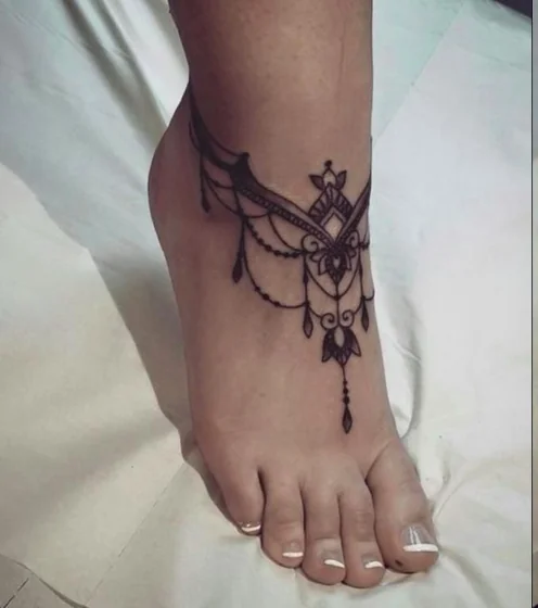 Fine Line Floral Bracelet tattoo idea for women on Ankle