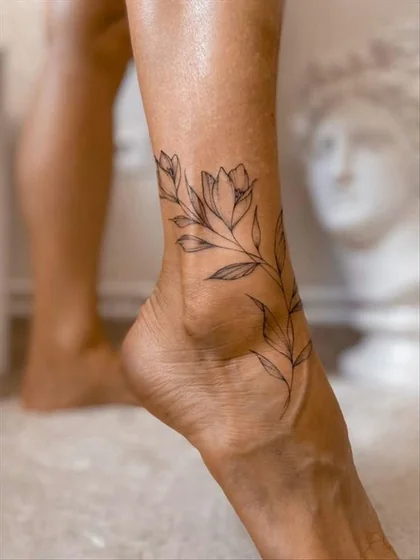Fine Line Floral tattoo design for women on Ankle and Calf