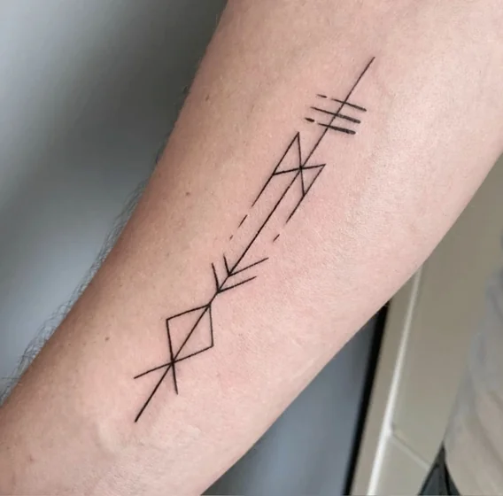 Fine Line Geometric Arrow tattoo design for men on forearm
