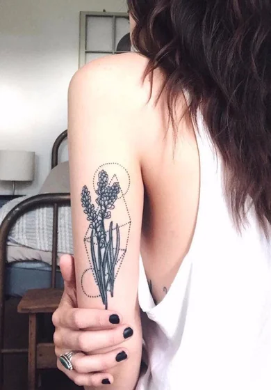 Fine Line Geometric Floral tattoo idea for women on Upper Arm