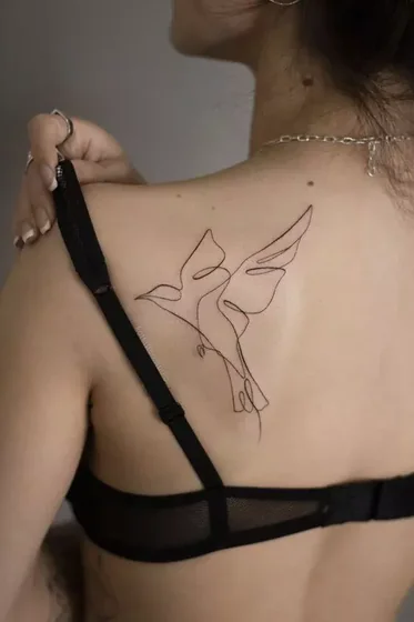 Fine Line Linework Bird tattoo idea for women on shoulder