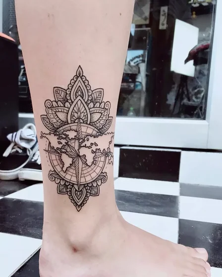 Fine Line Mandala Compass World Map Floral tattoo idea for women on calf