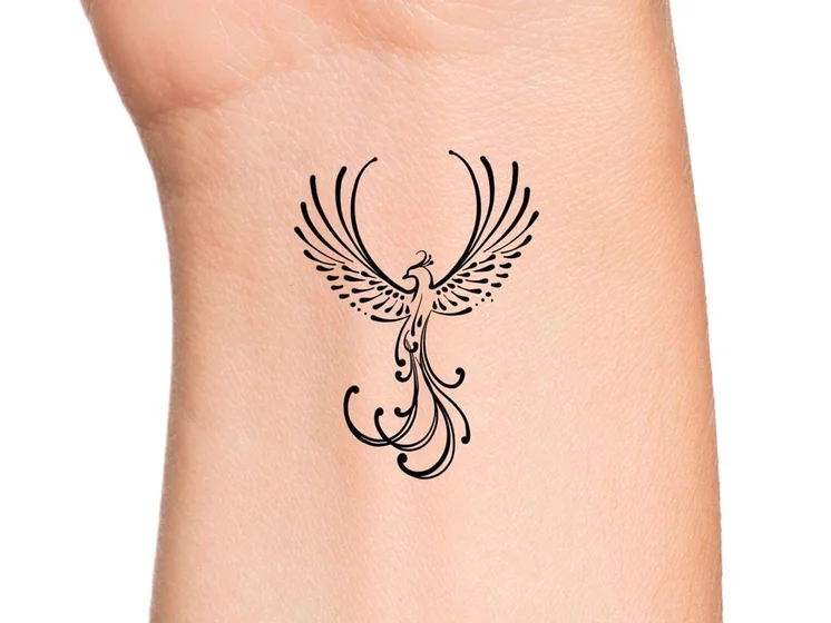 Fine Line Minimalist Phoenix tattoo design on wrist