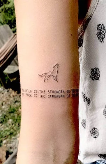 Fine Line Minimalist wolf and quote tattoo design for women on forearm