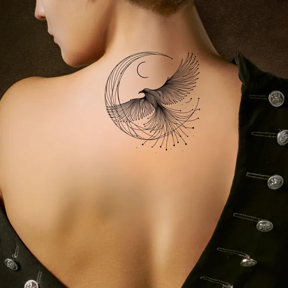 Fine Line Phoenix and Moon tattoo design for women on back and shoulder