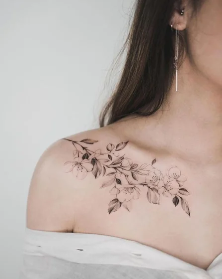 Fine Line Realism floral tattoo design for women on shoulder and chest