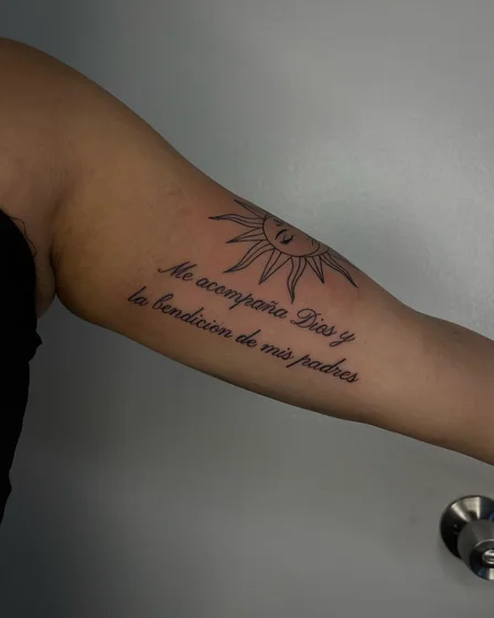 Fine Line Script Sun & Quote tattoo for women on Upper Arm