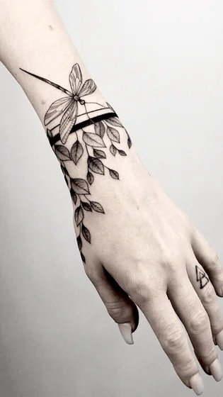 Fine Line Sketch Dragonfly and Floral tattoo design for women on Wrist