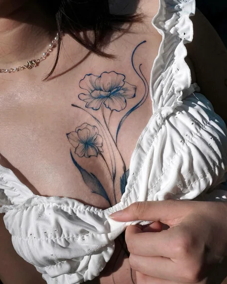 Fine Line Sketch Floral tattoo design for women on Sternum